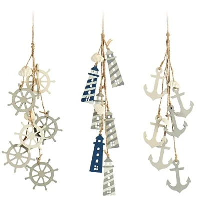 Afbeelding van COM FOUR® 3 x Maritieme hangende decoratie stuurwiel, anker en vuurtoren met schelpen houten hangdecoratie (3 stuks grijs/wit/blauw)