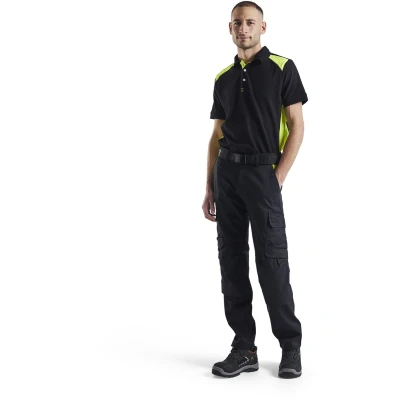 Afbeelding van Blaklader Industrie werkbroek stretch met kniezakken 1448 1832 Zwart/High Vis Geel C144