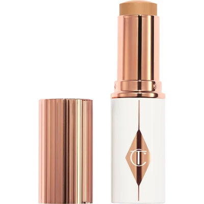 Afbeelding van Charlotte Tilbury Unreal Skin Sheer Glow Tint Hydrating Foundation Stick 9 Tan Gram