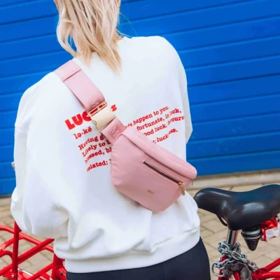 Afbeelding van Roze crossbody heuptas dames nylon MŌSZ Jessy