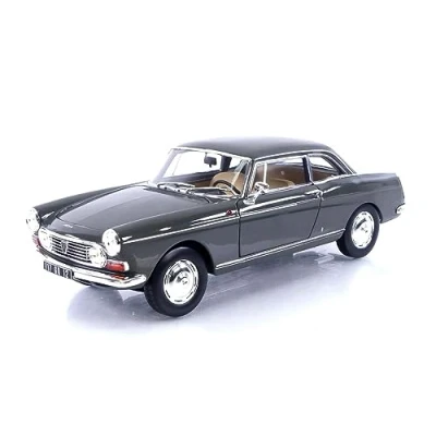 Afbeelding van het 1:18 gegoten model van De Peugeot 404 Coupé uit 1967 in grijs. fabrikant schaalmodel is Norev. Dit alleen online verkrijgbaar