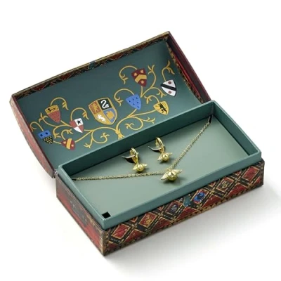 Afbeelding van The Carat Shop Harry Potter Zwerkbal Collector Geschenkdoos met Golden Snitch Halsketting en Oorbellen