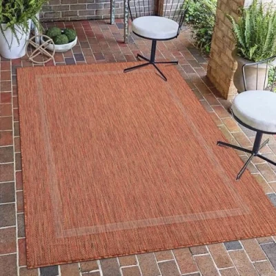 Afbeelding van Carpetsale24 Vloerkleed voor binnen en buiten, weerbestendig, sisal look, effen, koperkleurige rand, plat geweven, perfect balkon, terras, keuken of woonkamer, afmetingen 120 x 170 cm