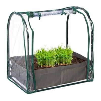 Afbeelding van kweekkas folie buiten plantenzak 70x68x50 cm stalen frame deur met rits