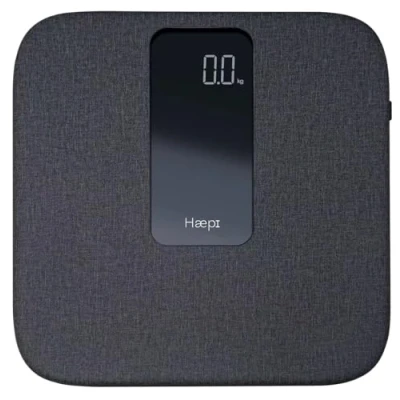 Afbeelding van Haepi Elektronische personenweegschaal Super comfortabel en aangenaam aanvoelend linnen plateau Modern elegant design Maximale capaciteit van 180 kg 15 jaar garantie Inclusief batterijen Linnen.