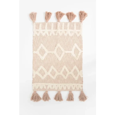 Afbeelding van Beige badmat met geometrische figuren
