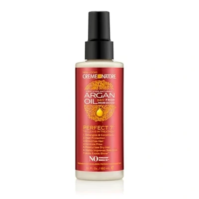 Image de Creme of Nature Argan Oil Soin Perfect 7 Spray Cheveux bénéfices en 1 produit des Bouclés Frisés et Crépus à l’Huile d’Argan du Maroc Sans Rinçage Flacon de 150ml