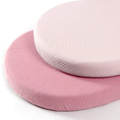 Afbeelding van Set van 2 katoenen mousseline hoeslaken: kinderwagenlaken, matrashoes voor babybed en bijzetbed 90 x 40 cm (roze oogje)