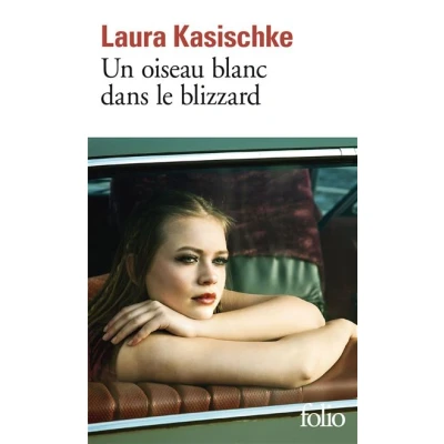 Image de Un oiseau blanc dans le blizzard