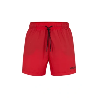 Afbeelding van HUGO BOSS heren Haiti zwemshorts met logo in de kleur Rood, maat: M/L