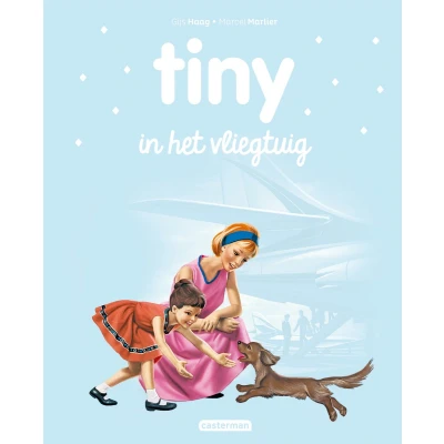 Afbeelding van Tiny in het vliegtuig