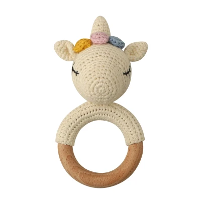 Afbeelding van Dutsi Houten Bijtring &amp; Rammelaar Met Gebreid Dierenfiguurtje Ø 7 cm Unicorn