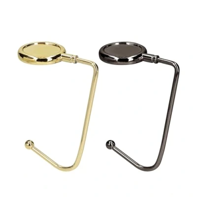 Afbeelding van kwmobile Tassenhaken voor tafel Set van 2 draagbare tashangers Tassenhangers of kast In goud / zwart