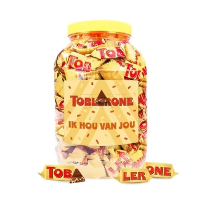 Afbeelding van Toblerone mini chocolade &quot;Ik Hou Van Jou&quot; melkchocolade met nougat, amandel en honing 1000g