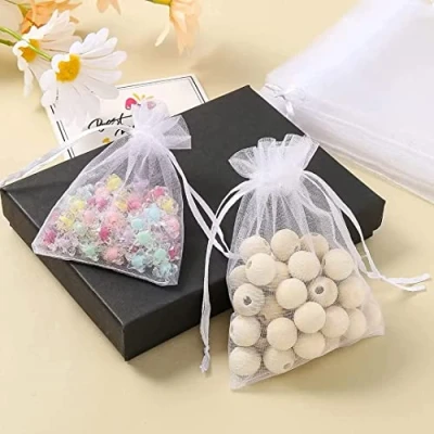 Afbeelding van HERZWILD Organza kerstzakjes, 100 stuks, wit, klein (9 x 12)