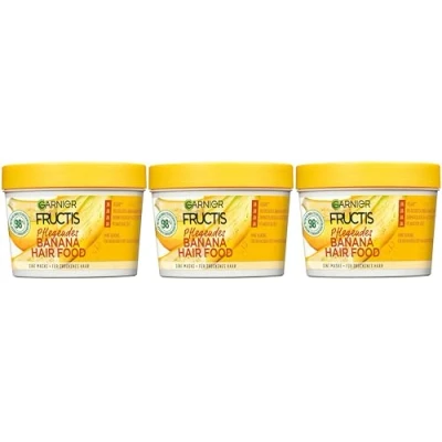 Afbeelding van Garnier Fructis Hairfood Banana 3 in 1 vochtinbrengende maskers voor droog haar, verzorgt en maakt het haar glad (3 x 390 ml)