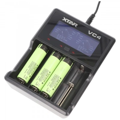 Afbeelding van 3x Panasonic 18650 Li ion batterij en 4 weg snellader