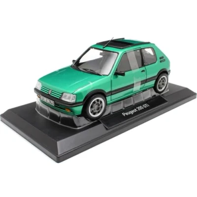 Afbeelding van het 1:18 gegoten model van De Peugeot 205 1.9 GTI met raamdak uit 1991 in groen. fabrikant schaalmodel is Norev. Dit alleen online verkrijgbaar