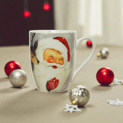Afbeelding van Kerstmok van porselein met kerstman Kerst accessoire