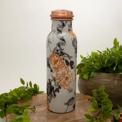 Afbeelding van Puur koperen waterfles bloemenprint wit ± 750 ml (zware uitvoering)