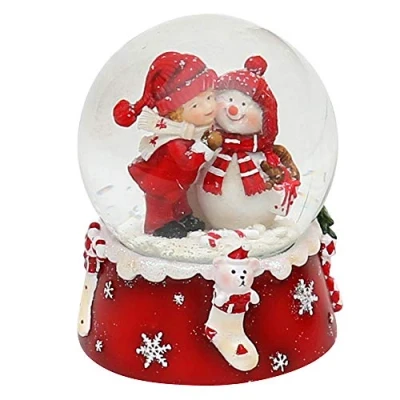 Afbeelding van Dekohelden24 Sneeuwbal Sneeuwpop met Kind Rood en Wit Afmetingen bal: ca. 8,5 x 7 cm/6,5 cm (hoogte breedte/diameter) 501065 SM+ Kind.