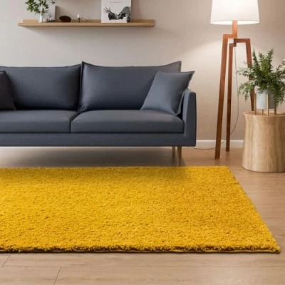 Afbeelding van Interiyou Sofia hoogpolig tapijt 133 x 190 cm geel pluizig effen wasbaar antislip zacht