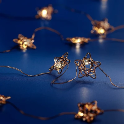 Afbeelding van Micro LED string met bronzen sterren 190 cm lang 20 LED&#039;s