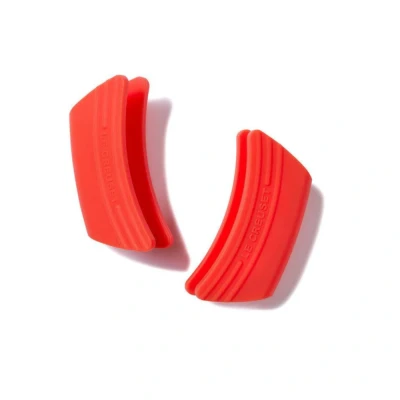 Afbeelding van Le Creuset Silicone Set Van 2 Handvatten In Oranjerood