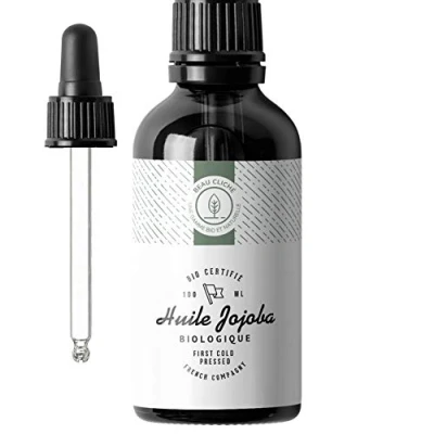 Afbeelding van 100 ml jojoba olie, biologisch, koudgeperst, zuiver 100% natuurlijke verzorging voor huid, haar, baard fles van glas gevuld in Frankrijk