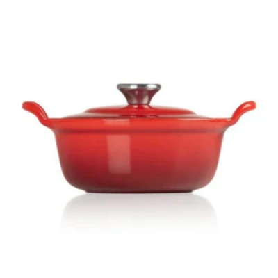 Afbeelding van Le Creuset Gietijzeren Ronde Braadpan Met Plaatstalen Deksel In Kersenrood 32cm 7,8l