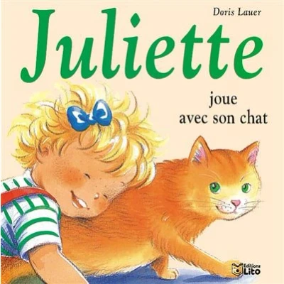 Image de Juliette joue avec son chat