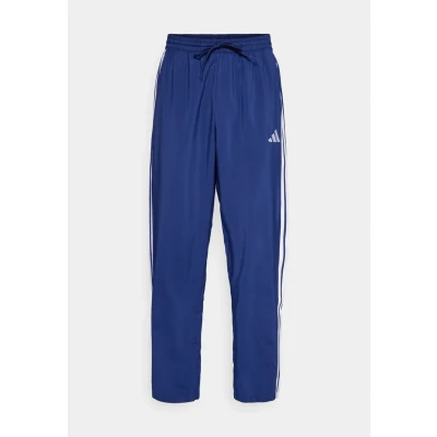 Afbeelding van adidas Sportswear Essential Three Stripes Stanford OPEN Trainingsbroek, Heren, Maat: XS, Dark blue/white