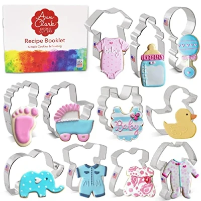 Afbeelding van Ann Clark 11 stuks babyshower uitsteekvormen gemaakt in de VS door Clark, onesie, slabbetje, rammelaar, fles, voet, pyjama, jurk, eend