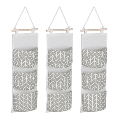 Afbeelding van Relaxdays hangende opberger 3 vakken stof organizer wand badkamer grijs