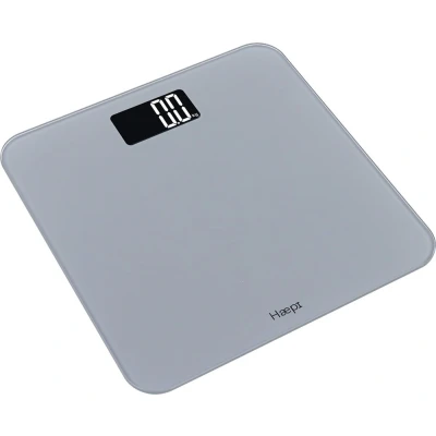 Afbeelding van Haepi Elektronische personenweegschaal Groot verlicht scherm voor perfecte leesbaarheid Modern en elegant design Maximale capaciteit van 180 kg 15 jaar garantie Inclusief batterijen Metallic Silver