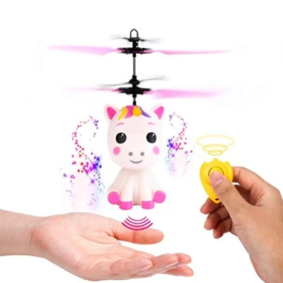 Afbeelding van Guanan Mini Flyer eenhoorn met afstandsbediening en USB kabel vliegende led effect handgestuurde propeller voor kinderen vanaf 6 jaar